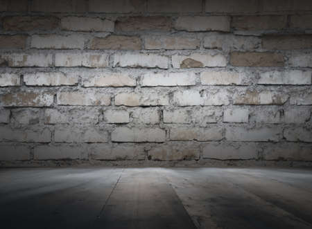 old interior with brick wall, dark vintage backgroundの写真素材