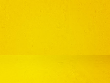 yellow plaster wall, old grunge room, interior backgroundの写真素材