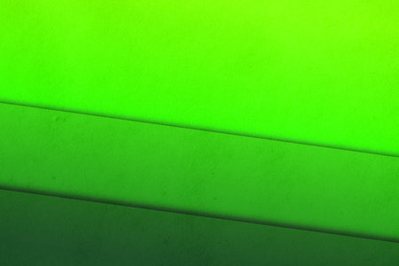 green abstract vintage background on old retro paper texture