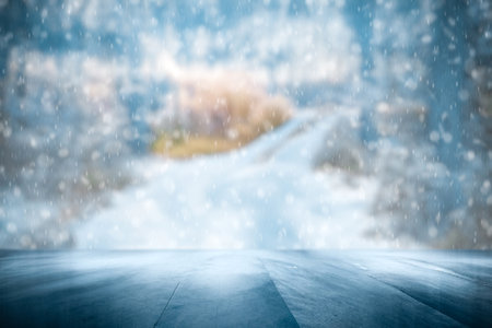 Old frozen wooden table and snowy forest. Christmas and new year winter background.の写真素材