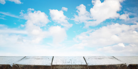 white wooden table, beautiful blue sky. background.の写真素材