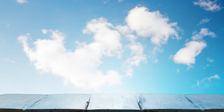 wooden table, beautiful blue sky. background.の写真素材