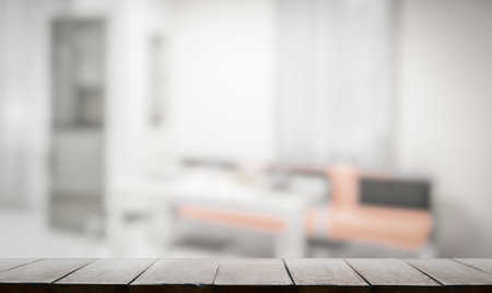 wooden table, blurred room, interior backgroundの写真素材
