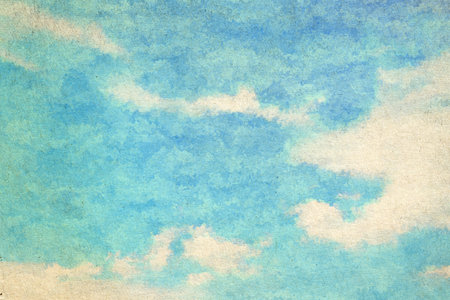 retro sky painting pattern on old paper texture. vintage watercolor clouds.の写真素材