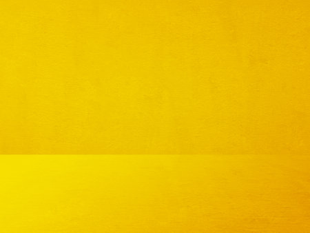yellow plaster wall, old grunge room, interior backgroundの写真素材