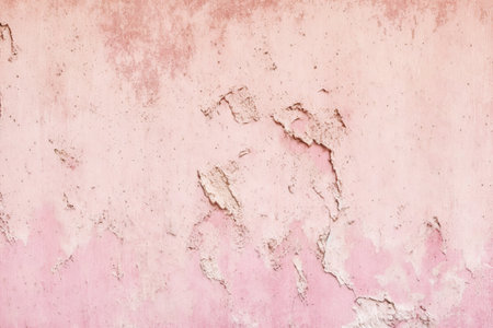 old pink concrete background, grungy plaster wallの写真素材