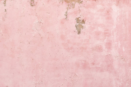 old pink concrete background, grungy plaster wallの写真素材