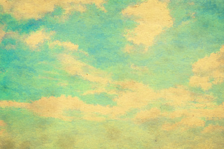 retro sky painting pattern on old paper texture. vintage watercolor clouds.の写真素材