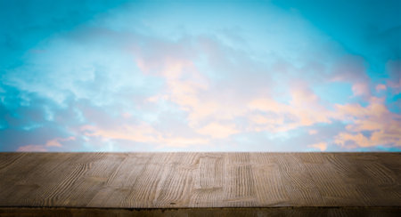 brown wooden table, beautiful blue sky. background.の写真素材