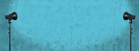 lighting studio equipment, color concrete background, blue plaster wall, banner sizeの写真素材
