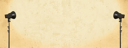 lighting studio equipment, color concrete background, yellow plaster wall, banner sizeの写真素材