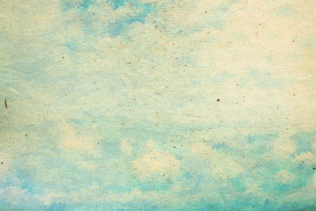 retro sky painting pattern on old paper texture. vintage watercolor clouds.の写真素材