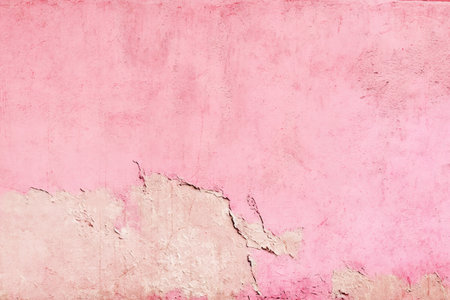 old pink concrete background, grungy plaster wallの写真素材
