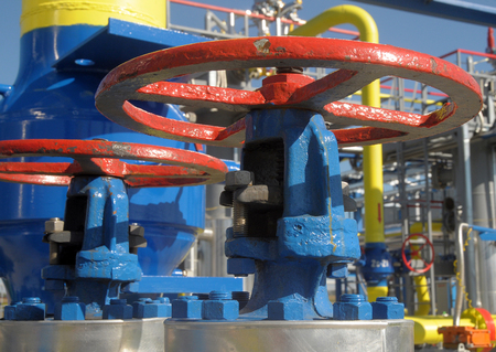 Gas valves are on the gas compressor station in a sunny summer dayの写真素材