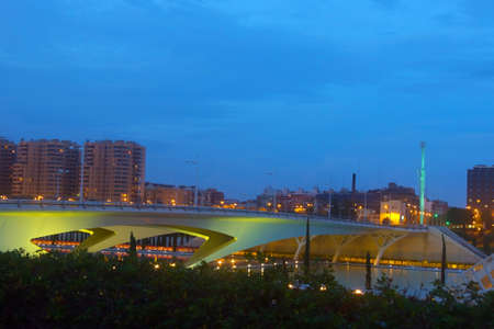 VALENCIA  NOVEMBER 17: Valencia city skyline over the Monteolivete bridge at dusk on November 17, 2012 in Valencia, Spain. The bridge was designed by the great Valencian architect Santiago Calatrava.のeditorial素材