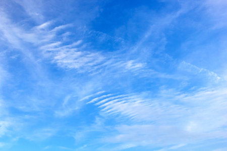 White clouds making pattern in blue sky