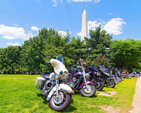 Motorbikes are resting after the ride near Washington National Monument  Washington, DC  National Monument and multi-colored motorbikes のeditorial素材