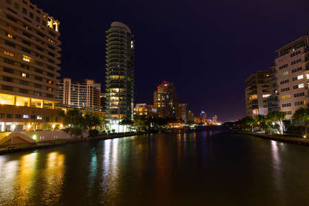 Miami Beach city landscape at night  Modern buildings along the waterfront with colorful reflections の写真素材