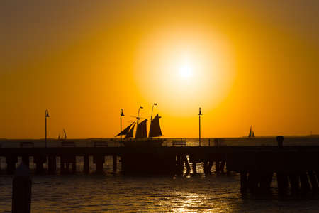 Sunset at Key West, Florida  Yachts with tourists in the ocean at beautiful sunset の写真素材
