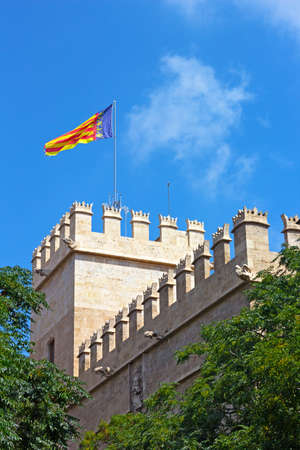 The former Silk Exchange site in Valencia, Spain. Crenellated tower and rooftop of 15th century Llotja de la Seda (Silk Exchange).のeditorial素材