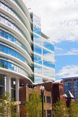 Coexistence of modern and historic architecture in Washington DC. Modern and historic downtown buildings next to each other.のeditorial素材