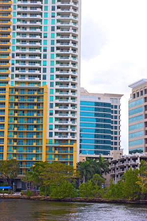 Miami suburb on the canal waterfront. Suburban houses near the canal and palm trees.のeditorial素材