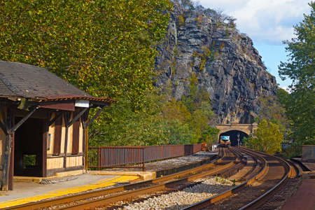 Harpers Ferry railroad tunnel in West Virginia, USA. The Harpers Ferry station and tunnel on a bright autumn day.の写真素材