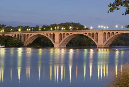 Key Bridge at sunrise in Washington Dc, USA. Bridge over Potomac River with reflections at dusk.の写真素材
