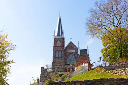 St. Peter's Catholic Church in Harpers Ferry, West Virginia, USA. Beautiful church on the hill in autumn.の写真素材