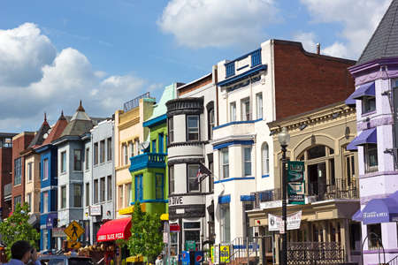WASHINGTON DC, USA MAY 9, 2015: Colorful historic buildings in Adams Morgan neighborhood on May 9, 2015 in Washington DC. Vibrant city street offers menu variety and musical entertainment at bars and restaurants.のeditorial素材