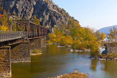 Appalachian trail crossing Shenandoah River in Harpers Ferry. Colorful autumn landscape from a scenic outlook in West Virginia, USA.の写真素材