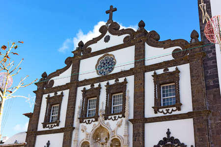 Facade of Saint Sebastian church in Ponta Delgada, Azores, Portugal. Main Church of Azores archipelago capital with Christmas decorations.の写真素材