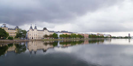 Waterfront city buildings along the canal in Copenhagen, Denmark. Copenhagen city panorama in summer.のeditorial素材