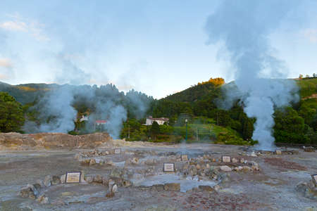 Geysers in the village of Furnas, Sao Miguel, Azores, Portugal. Pools of naturally boiling water in village valley.の写真素材
