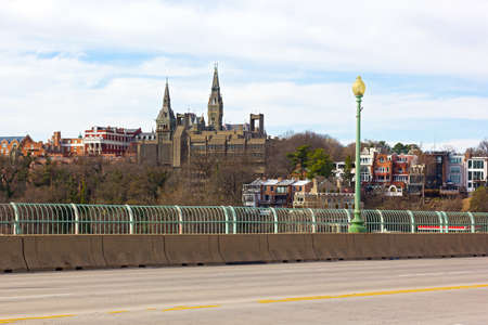 A view on Georgetown from Key Bridge in spring. Washington DC suburb on a high bank of Potomac River.のeditorial素材