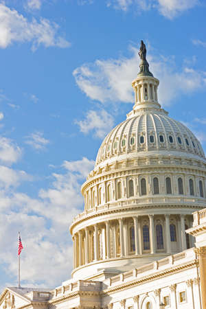 Statue of Freedom on top of US Capitol Building in Washington DC, USA. The view on the eastern side of the Capitol in the autumn morning.の写真素材