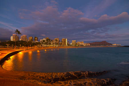 Honolulu panorama at night, Hawaii, USA. Waikiki beach after sunset on Oahu.の写真素材