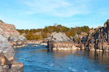 Potomac River in Great Falls Park in autumn, Virginia, USA. Scenic view on river waters and mountainous banks.の写真素材