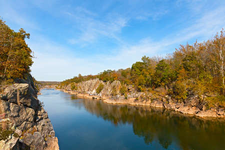 Potomac River in Great Falls Park in autumn, Virginia, USA. Scenic view on river quiet waters and mountainous banks.の写真素材