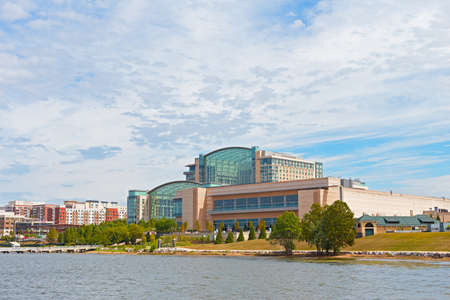 OXON HILL, MARYLAND, USA â SEPTEMBER 11: National Harbor waterfront buildings on September 11, 2016. The resort, restaurants and shops attract tourists and locals.のeditorial素材