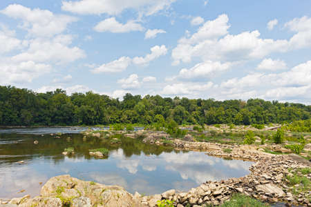Potomac River during summer in Virginia, USA. A small pond made on Potomac River with clouds reflection.の写真素材