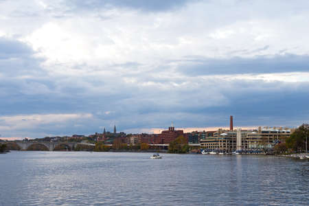 Quiet autumn sunset over Potomac River near Georgetown waterfront, Washington DC, USA. US capital panorama during sunset hours.の写真素材