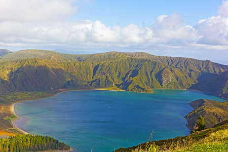Aerial view of Lake Fogo, Sao Miguel Island, Azores, Portugal. Mountainous landscape of volcanic island with crater lake.の写真素材