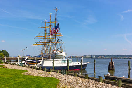 ALEXANDRIA, VIRGINIA, USA - SEPTEMBER 4 2017: U.S. Coast Guard tall ship docked in Virginia, USA. The Cutter Eagle visits cities along USA East Coast for free public tours.のeditorial素材