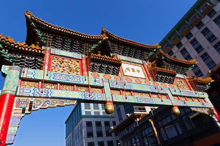Friendship Archway in Chinatown suburb of Washington DC, USA. The colorful work of public art with seven roofs on a bright sunny day.のeditorial素材