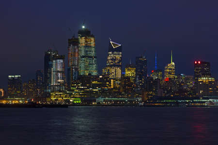 NEW YORK, USA â DECEMBER 22, 2017: Hudson River waterfront of Manhattan at the night after winter solstice.のeditorial素材