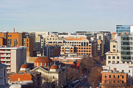 A view on Chinatown suburb development in Washington DC, USA. Modern and historic architecture od US capital suburb in winter.の写真素材