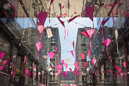 DC City Center festive spring atmosphere accompanies cherry blossom events in Washington DC, USA. The overhead installation inspired by the Cherry Blossom Kite Festival.の写真素材