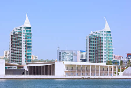 Lisbon city landscape with two modern apartment towers with sail like rooftops. City neighborhood with waterfront in Lisbon, Portugal.のeditorial素材