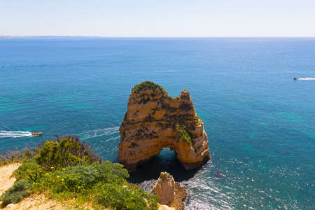 A view from the sea cliff. Spectacular vistas of Algarve coastline in Lagos, Portugal.の写真素材